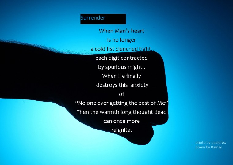 Punch by hand on a blue background close-up