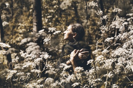 fashion model portrait. beautiful young woman in forest