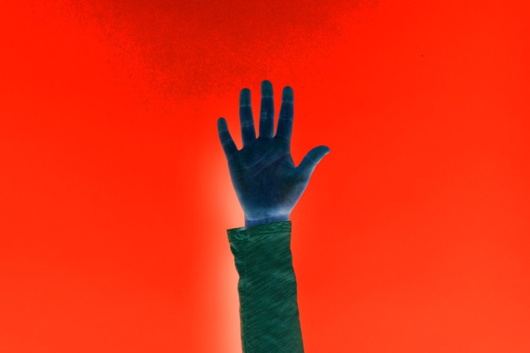 Person raing their hand